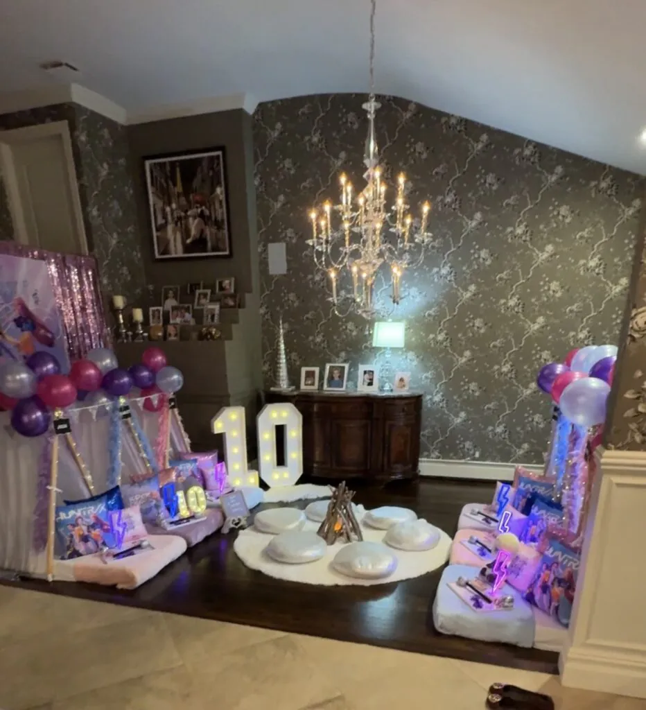 K-pop slumber party theme with fireplace