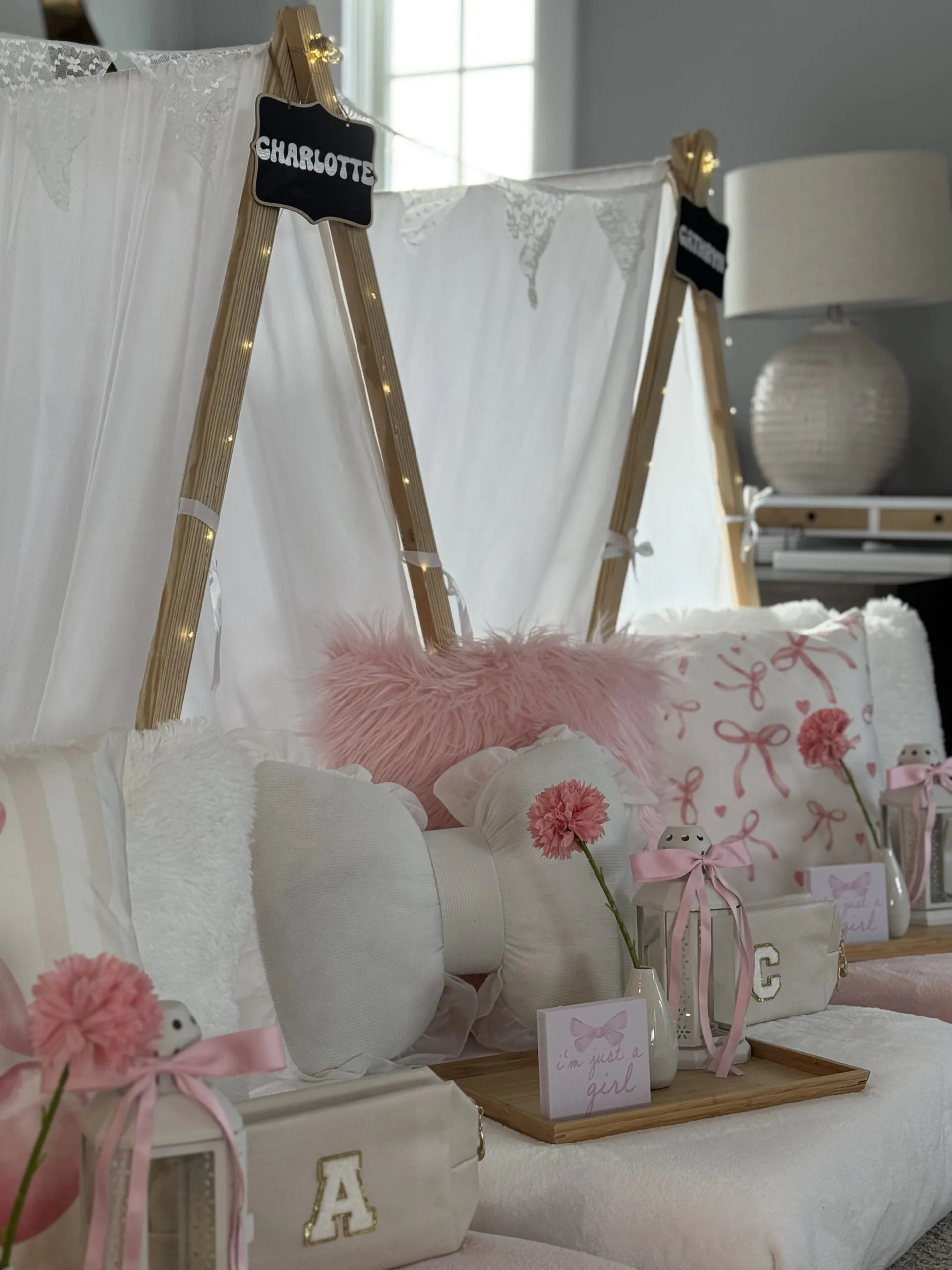 mongrammed cosmetic case favors on teepees slumber party setup