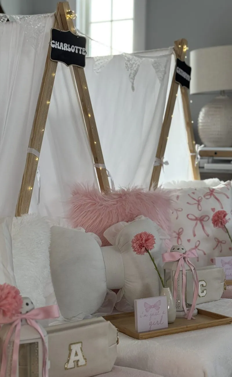 mongrammed cosmetic case favors on teepees slumber party setup